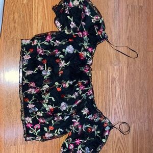 Black puff sleeve crop top with pink floral design